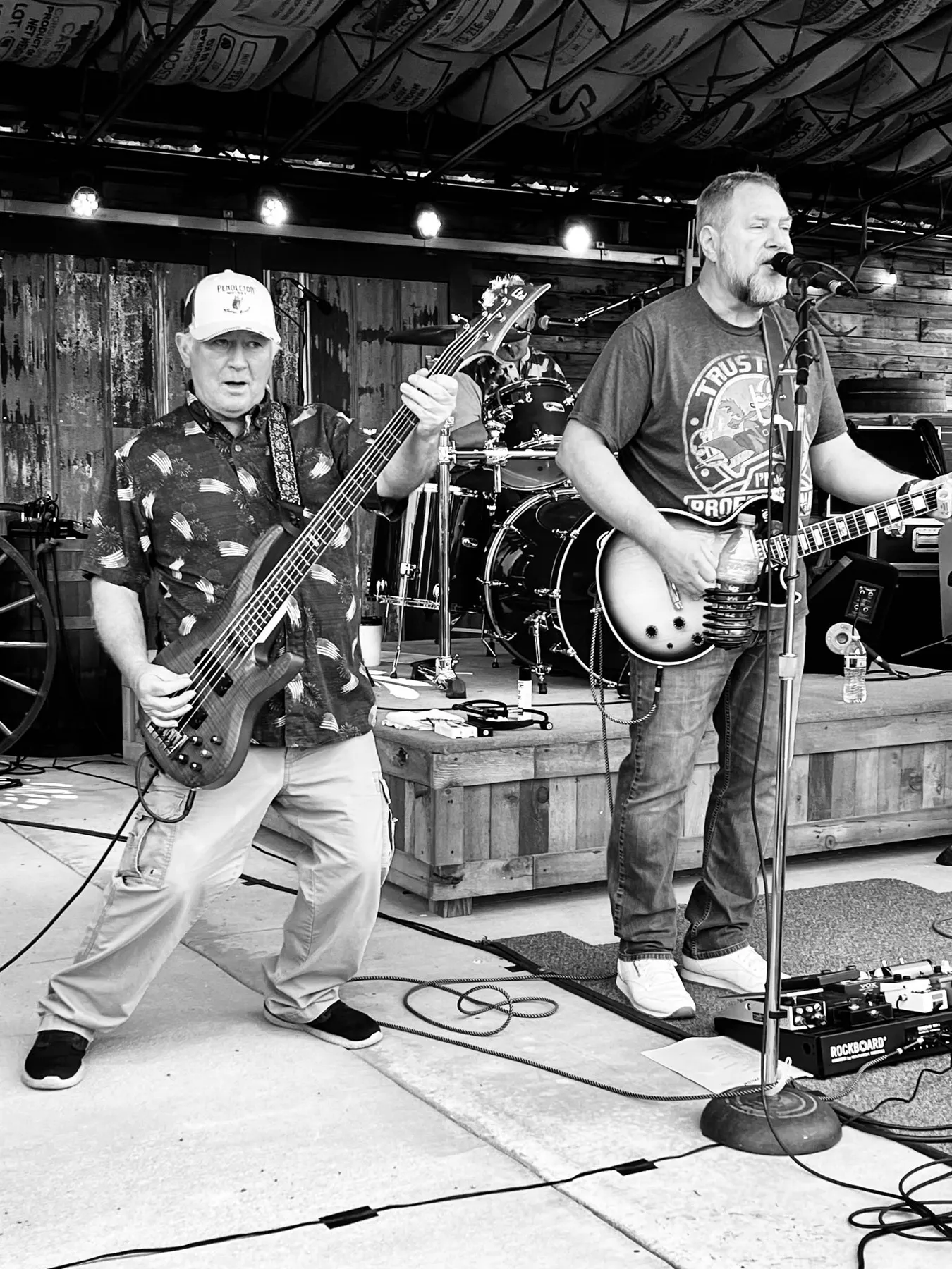 Bassist and singer rocking out on stage